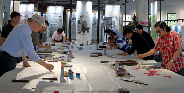 城乡投东风韵项目举办“大者云南”书画展暨艺术笔会