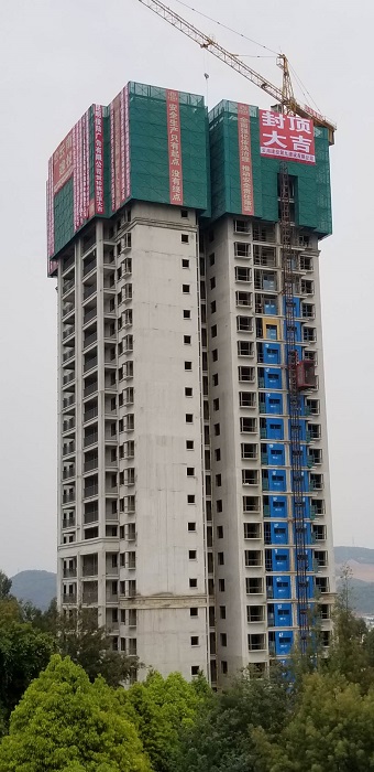 ​九公司昆明空港大板桥B地块项目首栋主体封顶  