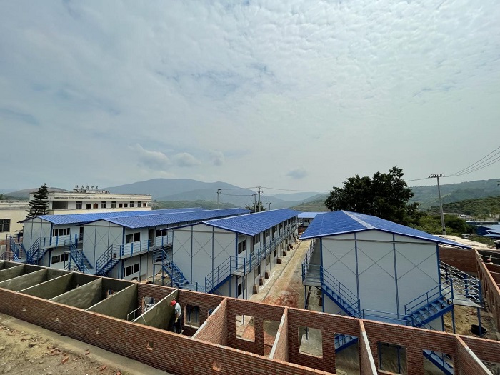 十八公司参与元江县曼来镇泥石流灾害过渡房建设